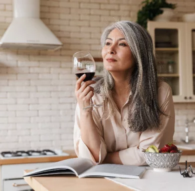 Mature Woman Drinking Wine