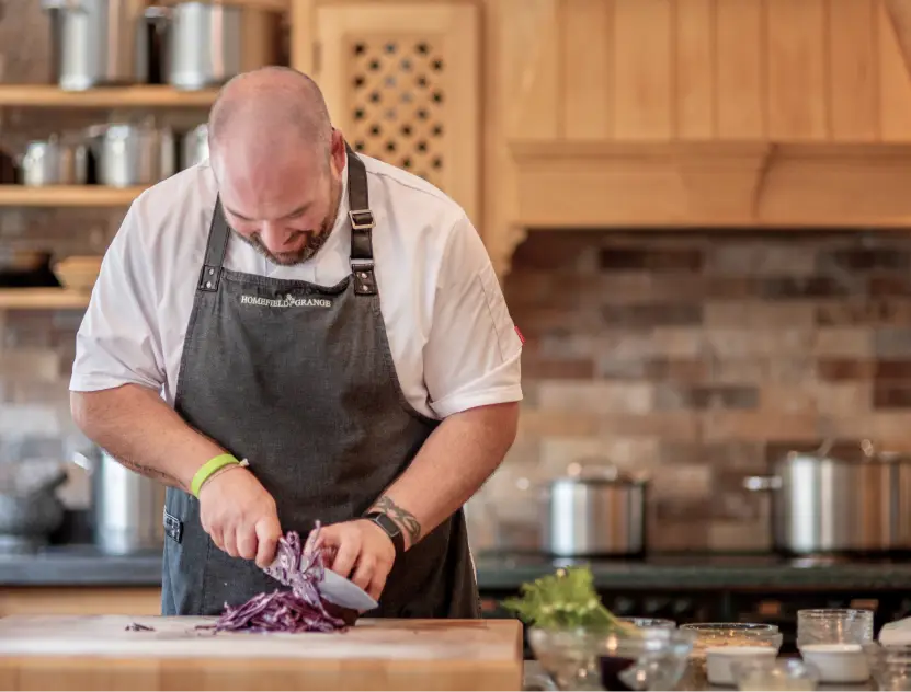 Chef preparing 2 course plant based lunch at Homefield Grange Health and Wellness Detox Retreat