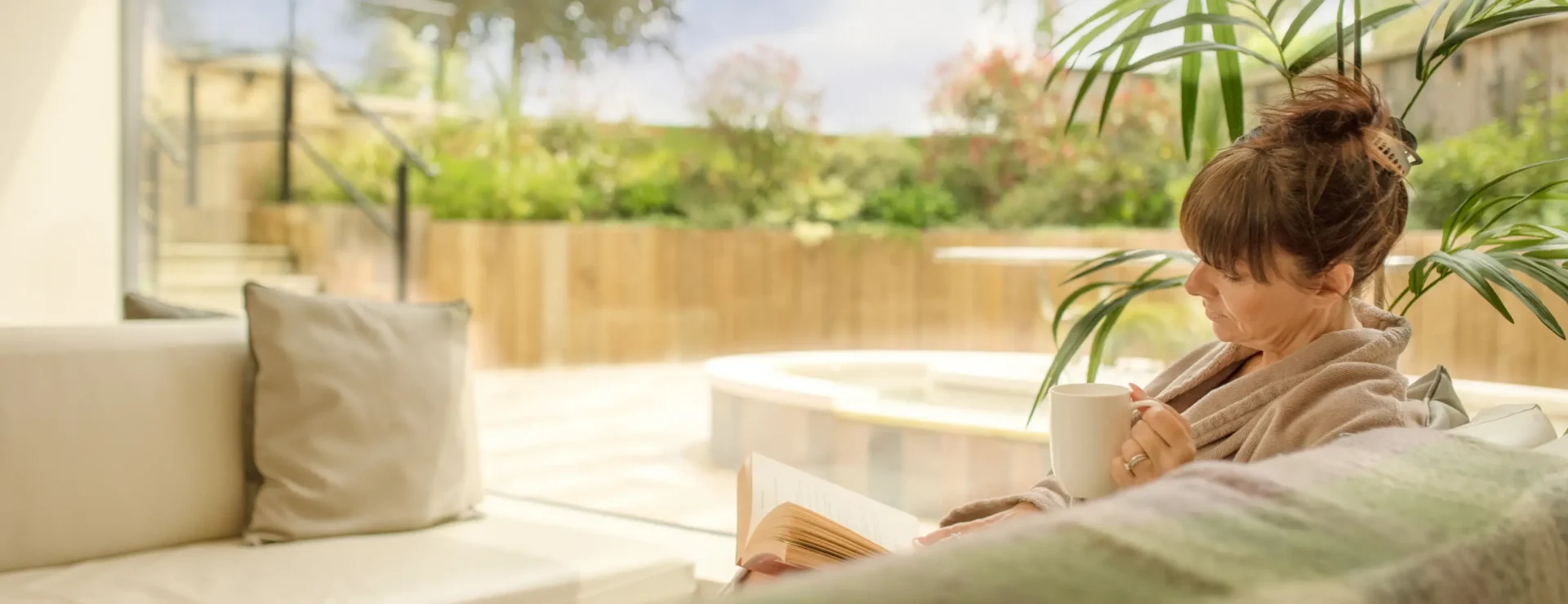 Guest resting quietly during a wellness retreat at Homefield Grange, with space to slow down and reflect.