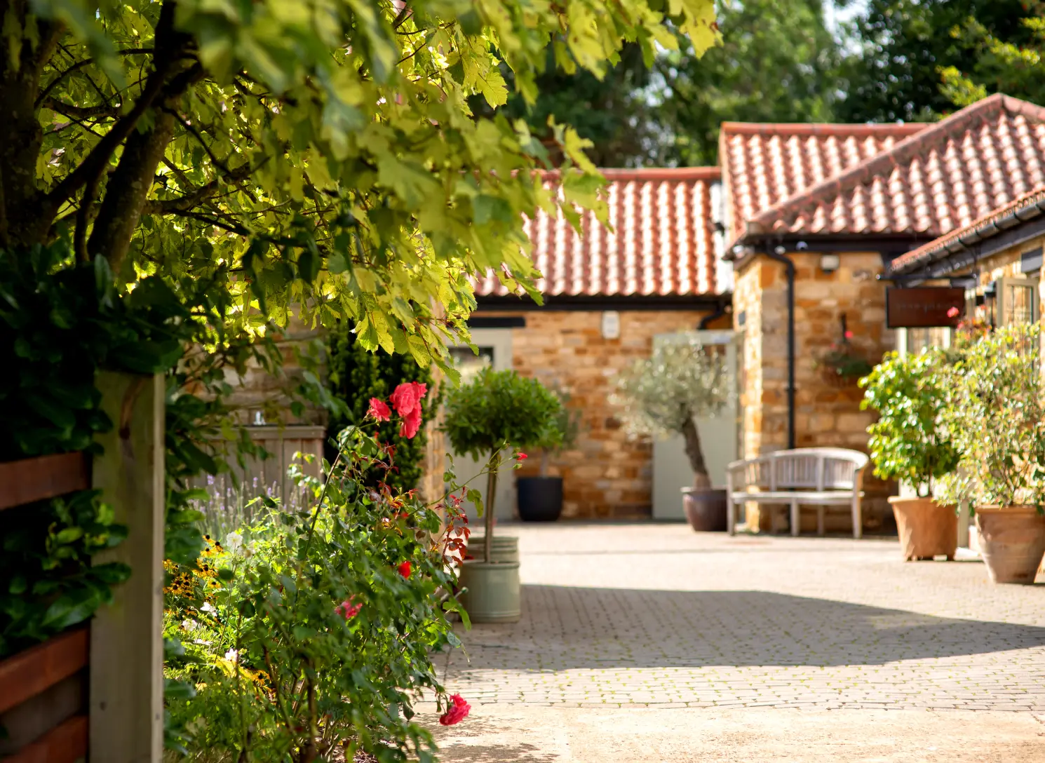 Peaceful courtyard garden at Homefield Grange retreat venue