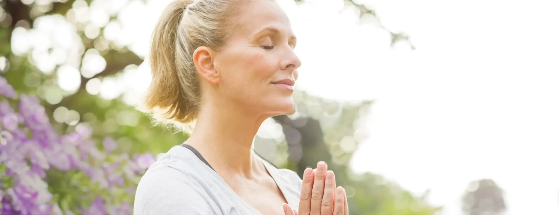 Woman taking a peaceful moment during the New You Reset wellness retreat at Homefield Grange